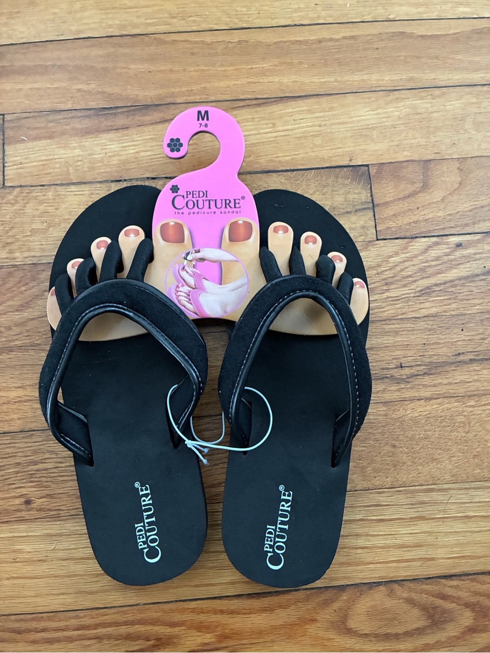 Women's Black Toe-Sep Flip Flop Sandals